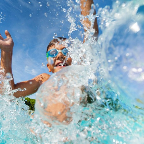 a person swimming in a pool